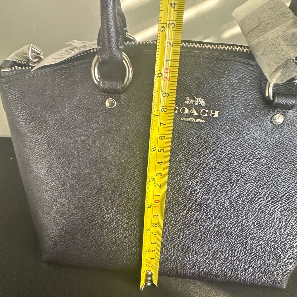 NWT Coach Metallic Sadie satchel.
